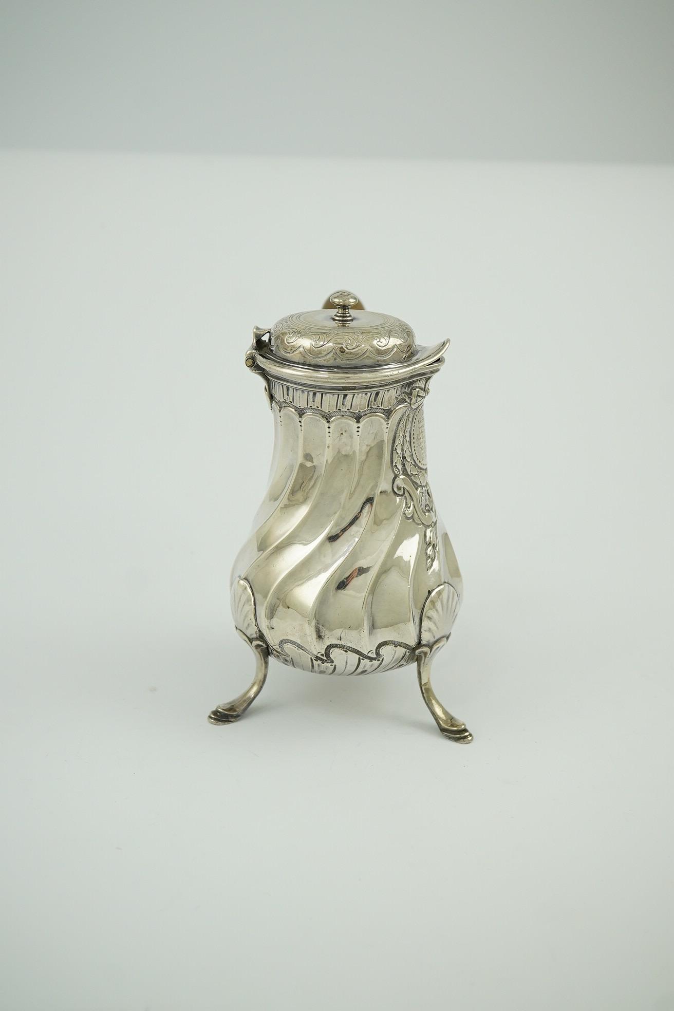 A late 18th century French cafe au lait pot